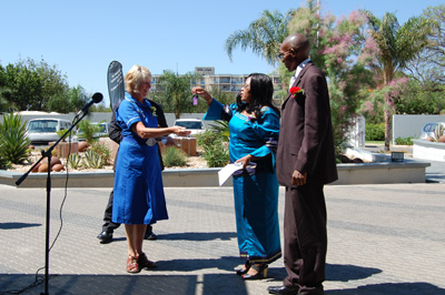 Linda Bullen hands over the keys to the new ambulance